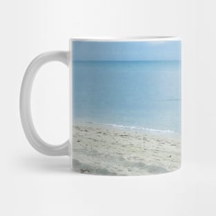 The blue sky and the beach Mug